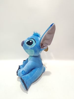 Il giocattolo di peluche parlante seduto Stitch è carino, con altezze di 7,09 pollici e 11,02 pollici