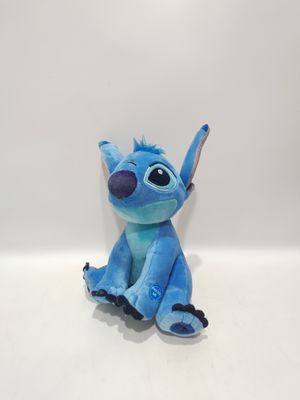 Il giocattolo di peluche parlante seduto Stitch è carino, con altezze di 7,09 pollici e 11,02 pollici