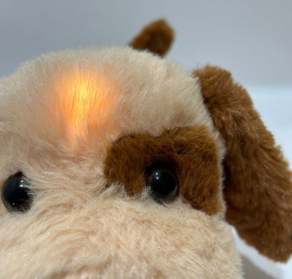 Cuccioli di peluche con luce e musica