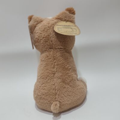 Cane di peluche morbido riscaldato con sacchetto di fagioli d'argilla all'interno