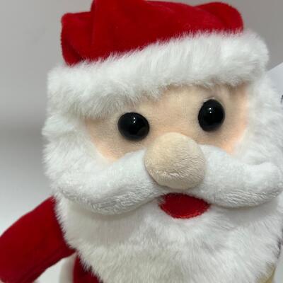 Peluche di Babbo Natale canterino e danzante con musica