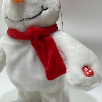 Pupazzo di neve di peluche natalizio che canta e balla con musica