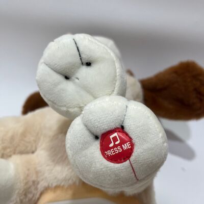 Simpatico peluche a forma di cane danzante con divertenti funzioni musicali