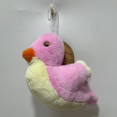 Giocattolo colorato per uccelli con bottoni in peluche per bambini e collezionisti