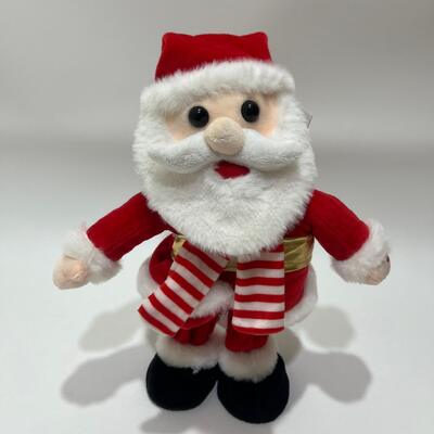 Peluche di Babbo Natale canterino e danzante con musica