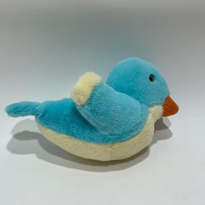 Giocattolo colorato per uccelli con bottoni in peluche per bambini e collezionisti